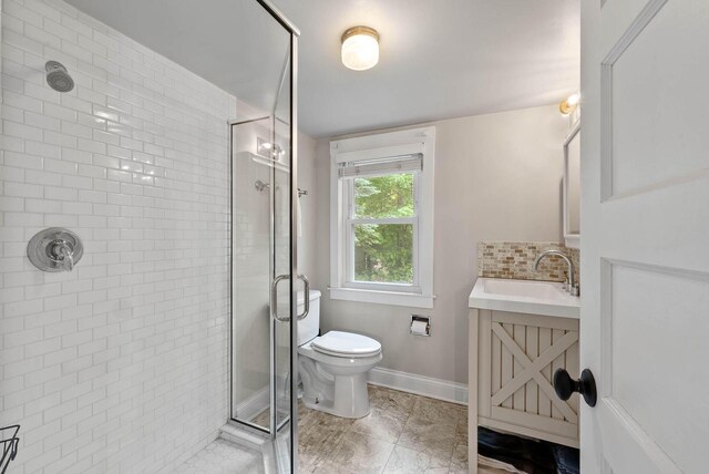 170 N Lakeshore Dr, Fontana, WI 53125 - full bathroom with a stall shower, toilet, and vanity
