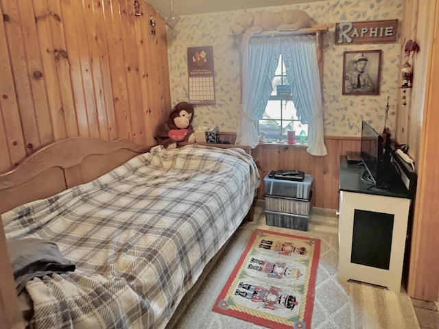 1657 N Elm Rd, Junction City, WI 54443 - bedroom featuring wallpapered walls, a wainscoted wall, and wood walls
