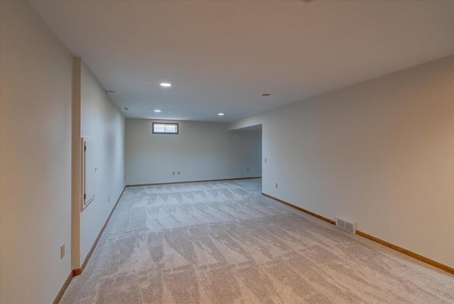 1230 N Westfield Rd, Madison, WI 53717 - spare room with light colored carpet and recessed lighting