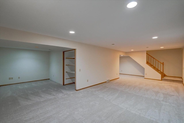 1230 N Westfield Rd, Madison, WI 53717 - finished basement featuring light carpet, stairway, and recessed lighting