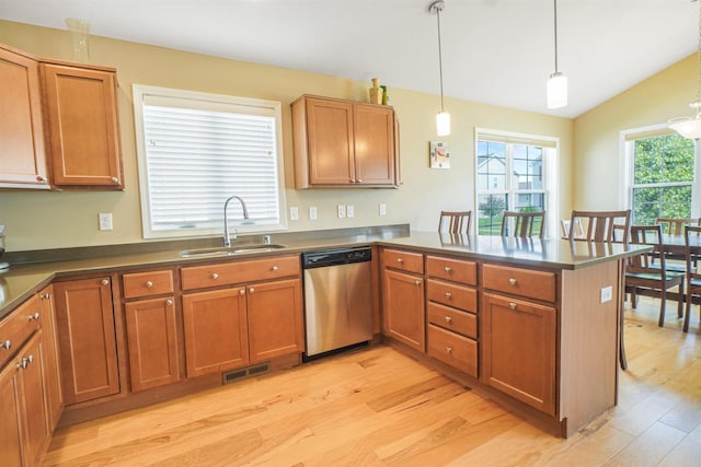 951 Lavender Way, Deforest, WI 53532 - kitchen featuring dishwasher, a sink, light wood-type flooring, a peninsula, and brown cabinetry