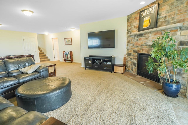 951 Lavender Way, Deforest, WI 53532 - living area with carpet flooring, a stone fireplace, and stairway