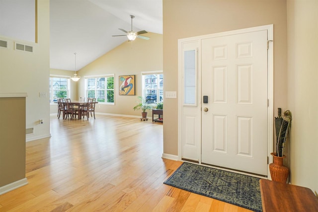 951 Lavender Way, Deforest, WI 53532 - foyer featuring a ceiling fan, light wood-style floors, high vaulted ceiling, and baseboards
