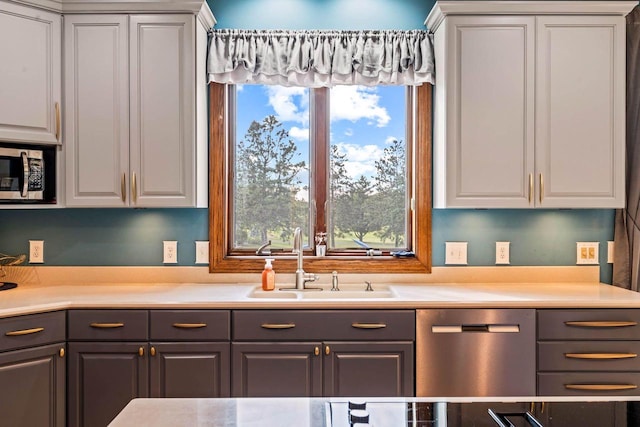 W4745 Briar Dr, Elkhorn, WI 53121 - kitchen featuring a sink, stainless steel appliances, white cabinetry, and gray cabinets