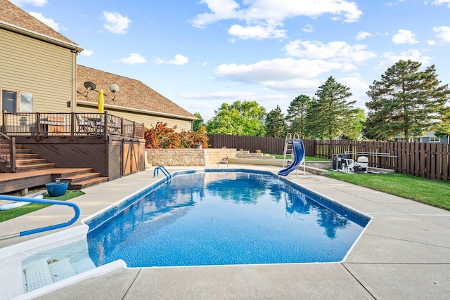 W4745 Briar Dr, Elkhorn, WI 53121 - view of pool with a water slide, a fenced backyard, a patio area, stairs, and a deck