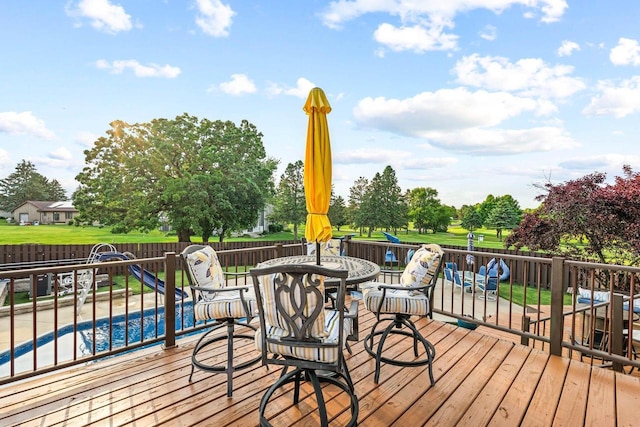 W4745 Briar Dr, Elkhorn, WI 53121 - wooden deck featuring a fenced backyard and outdoor dining space