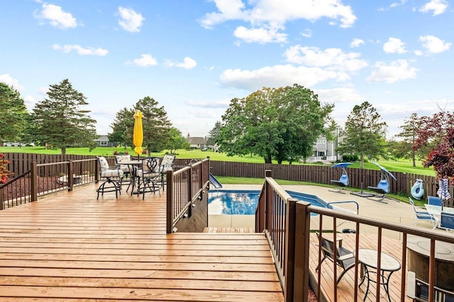 W4745 Briar Dr, Elkhorn, WI 53121 - wooden terrace featuring a fenced backyard, outdoor dining space, and a patio