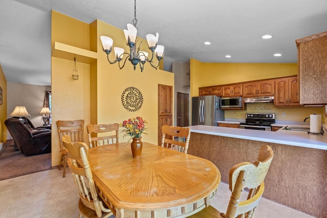 136 Yacoub Ln, Fond Du Lac, WI 54935 - dining room featuring recessed lighting, vaulted ceiling, a chandelier, and light tile patterned floors