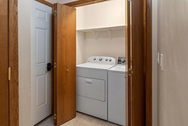 136 Yacoub Ln, Fond Du Lac, WI 54935 - laundry area featuring separate washer and dryer and light tile patterned floors