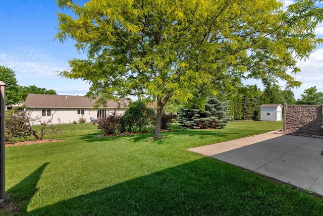 136 Yacoub Ln, Fond Du Lac, WI 54935 - view of green lawn with a patio