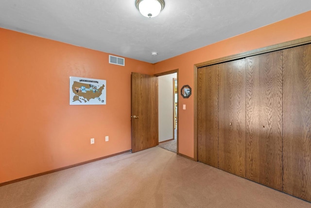 136 Yacoub Ln, Fond Du Lac, WI 54935 - unfurnished bedroom with carpet flooring, a closet, and baseboards