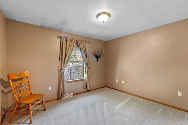 136 Yacoub Ln, Fond Du Lac, WI 54935 - sitting room with baseboards and light colored carpet