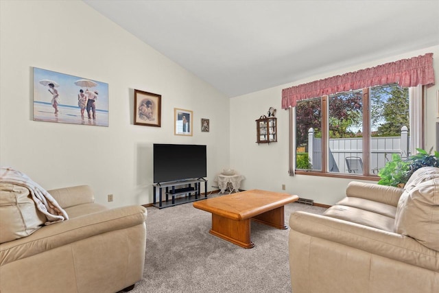 636 Westbury Ln Unit 12, Delavan, WI 53115 - carpeted living room with vaulted ceiling