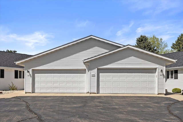 636 Westbury Ln Unit 12, Delavan, WI 53115 - single story home with asphalt driveway