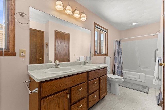 636 Westbury Ln Unit 12, Delavan, WI 53115 - bathroom with double vanity, shower / bath combo, toilet, and tile patterned floors