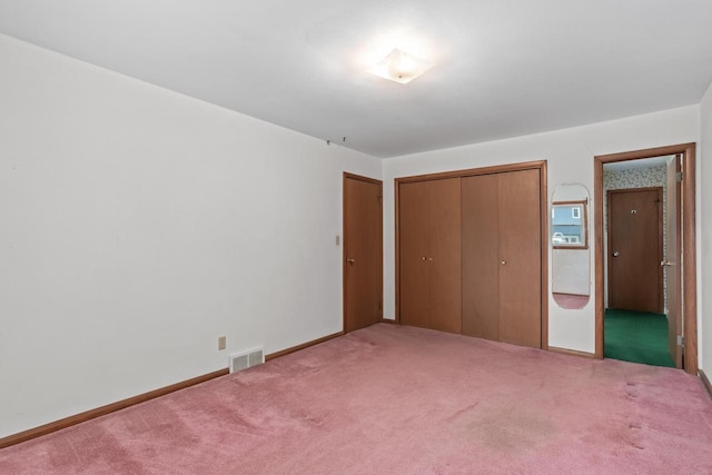 11549 N Meadowbrook Dr, Mequon, WI 53097 - unfurnished bedroom featuring carpet, a closet, and baseboards