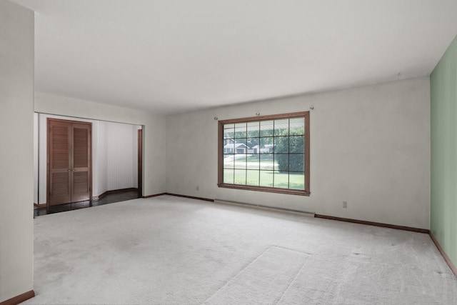 11549 N Meadowbrook Dr, Mequon, WI 53097 - spare room with carpet and baseboards