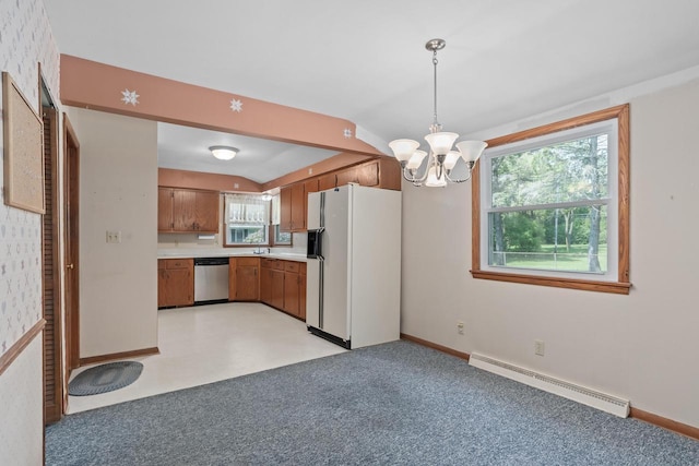 11549 N Meadowbrook Dr, Mequon, WI 53097 - kitchen featuring white refrigerator with ice dispenser, stainless steel dishwasher, baseboard heating, a chandelier, and brown cabinets