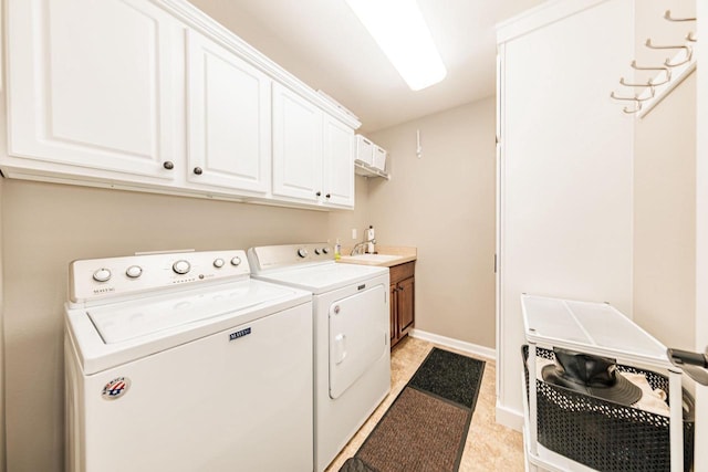 15370 Huff Way, Brookfield, WI 53005 - laundry area featuring cabinet space, washer and clothes dryer, and baseboards