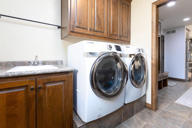 938 W Northstar Dr, Appleton, WI 54913 - washroom featuring washer and dryer, cabinet space, baseboards, recessed lighting, and stone finish flooring