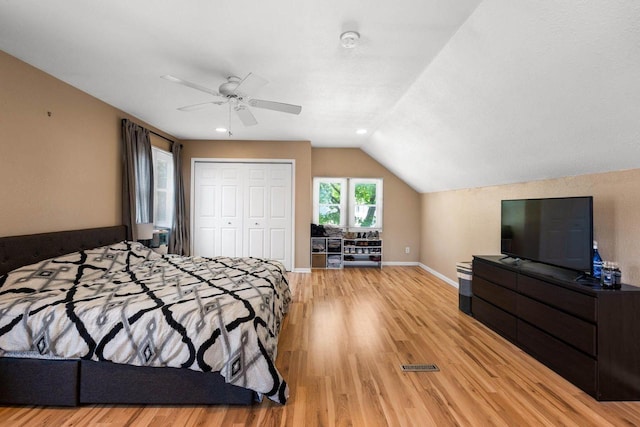 1568 S 63rd St, West Allis, WI 53214 - bedroom with light wood finished floors, a closet, lofted ceiling, ceiling fan, and baseboards
