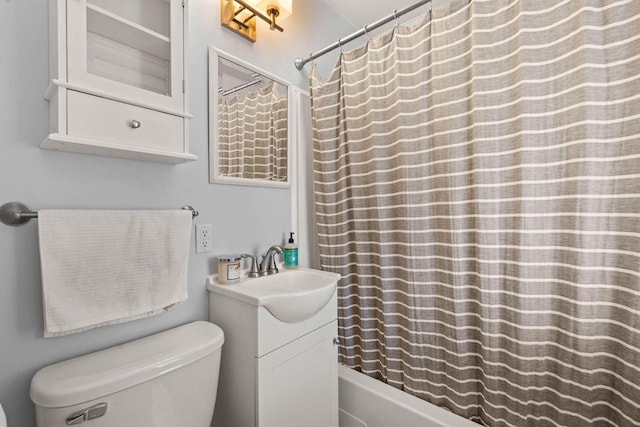1568 S 63rd St, West Allis, WI 53214 - full bath featuring toilet, shower / tub combo, and vanity