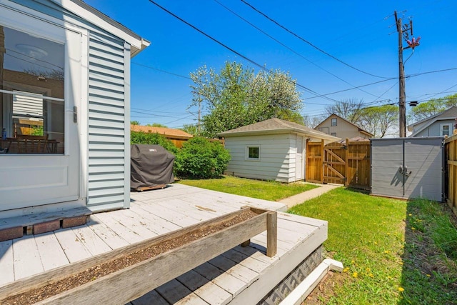 1568 S 63rd St, West Allis, WI 53214 - view of yard featuring a deck and a gate
