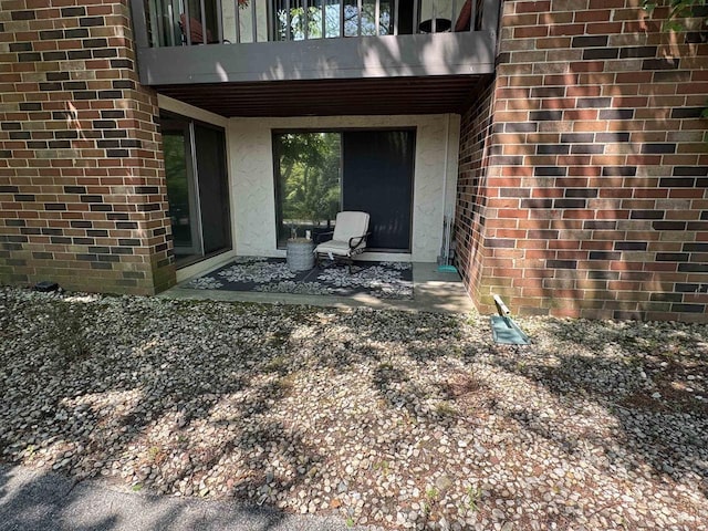 2470 W Good Hope Rd Unit 168, Glendale, WI 53209 - view of patio featuring a balcony