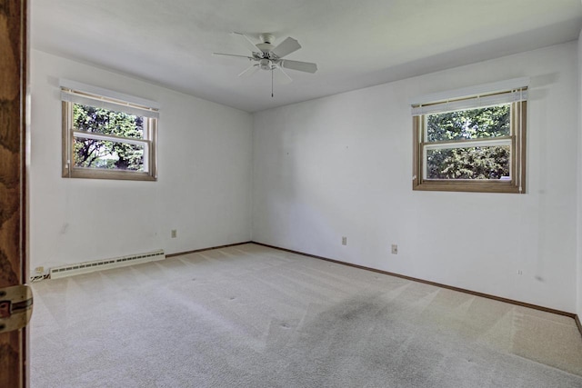 1016 E Marnie Ln, Appleton, WI 54911 - carpeted empty room with a baseboard radiator, ceiling fan, and baseboards