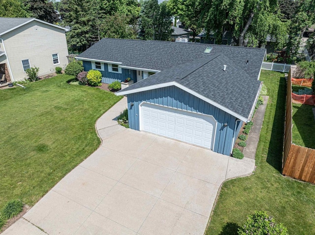 1016 E Marnie Ln, Appleton, WI 54911 - view of front of property featuring board and batten siding, roof with shingles, and a garage