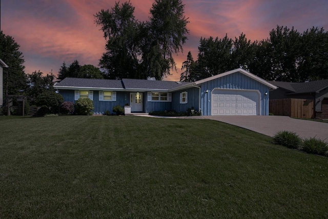 1016 E Marnie Ln, Appleton, WI 54911 - ranch-style house with an attached garage, driveway, and board and batten siding