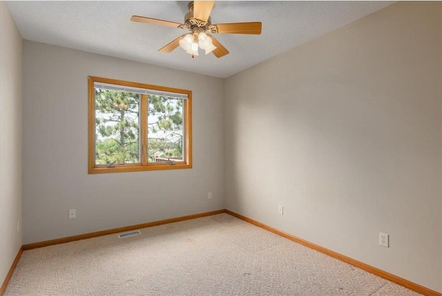 1102 Highpoint Ct, New Richmond, WI 54017 - empty room with light colored carpet, baseboards, a ceiling fan, and a textured ceiling