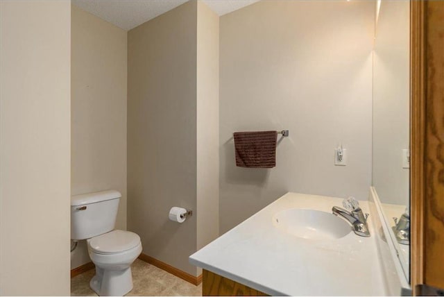 1102 Highpoint Ct, New Richmond, WI 54017 - half bathroom with vanity, toilet, and baseboards