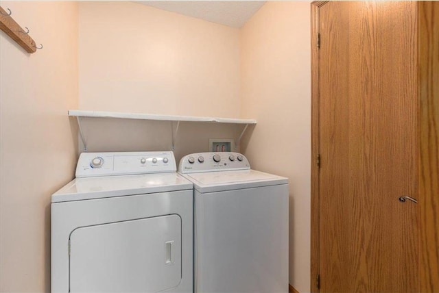 1102 Highpoint Ct, New Richmond, WI 54017 - laundry room with washing machine and dryer