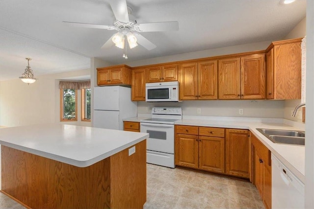 1102 Highpoint Ct, New Richmond, WI 54017 - kitchen featuring white appliances, a sink, brown cabinetry, and light countertops
