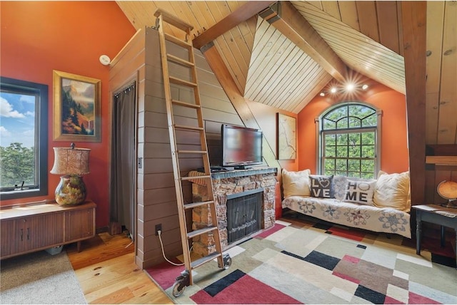 W11333 862nd St, River Falls, WI 54022 - living room with wood finished floors, a fireplace, and wooden ceiling