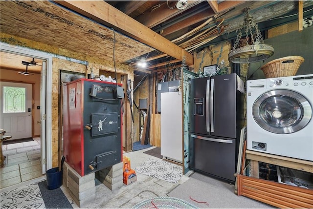 W11333 862nd St, River Falls, WI 54022 - below grade area with washer / clothes dryer, stainless steel fridge with ice dispenser, freestanding refrigerator, and heating unit
