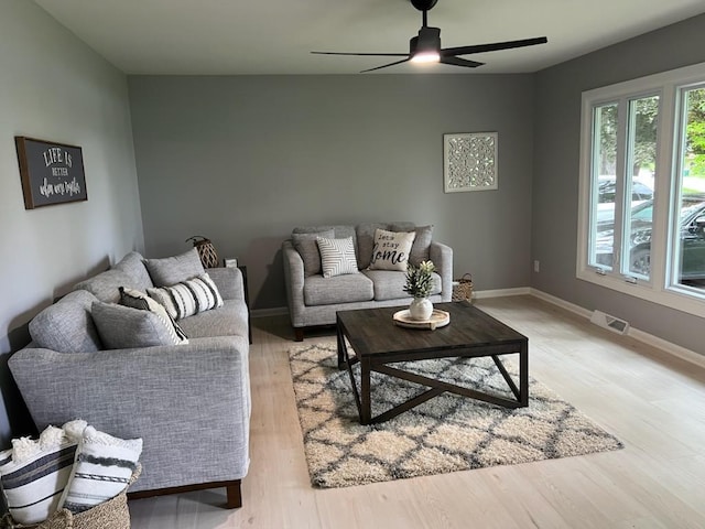 233 Inlet Shores Dr, Delavan, WI 53115 - living area featuring a ceiling fan, light wood finished floors, and baseboards
