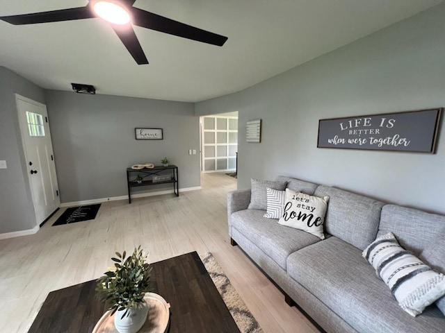 233 Inlet Shores Dr, Delavan, WI 53115 - living area featuring wood finished floors, a ceiling fan, and baseboards