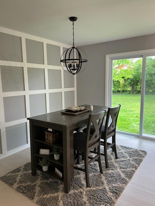 233 Inlet Shores Dr, Delavan, WI 53115 - dining room with a chandelier and wood finished floors