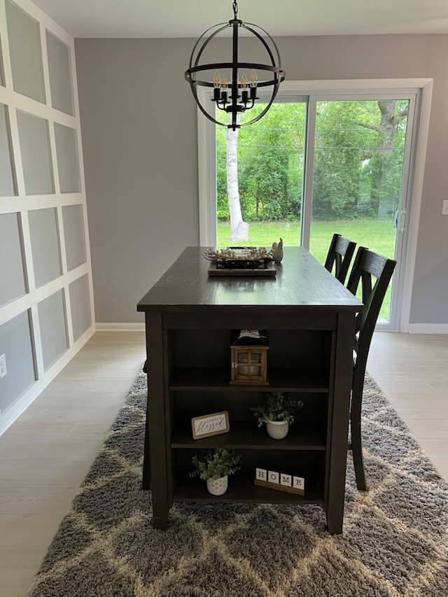 233 Inlet Shores Dr, Delavan, WI 53115 - dining room with a chandelier, baseboards, and light wood-type flooring