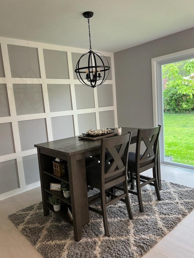 233 Inlet Shores Dr, Delavan, WI 53115 - dining room with a chandelier and wood finished floors