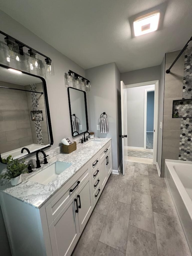 233 Inlet Shores Dr, Delavan, WI 53115 - bathroom featuring double vanity, shower / bath combination, and baseboards