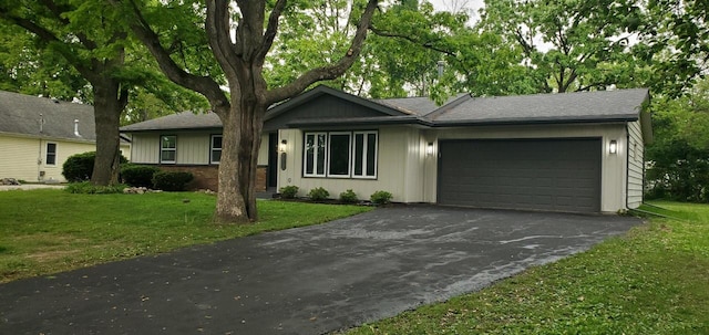 233 Inlet Shores Dr, Delavan, WI 53115 - single story home with a garage, driveway, and a front yard