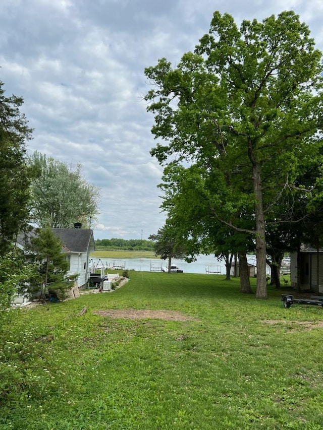 233 Inlet Shores Dr, Delavan, WI 53115 - view of green lawn with a water view