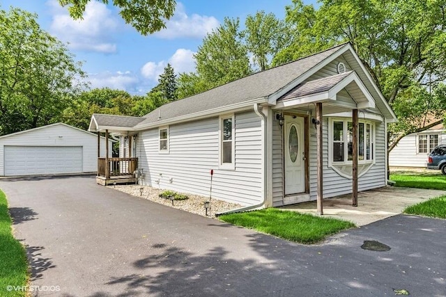 2605 Cameron St, Delavan, WI 53115 - single story home featuring an outdoor structure, a detached garage, and roof with shingles
