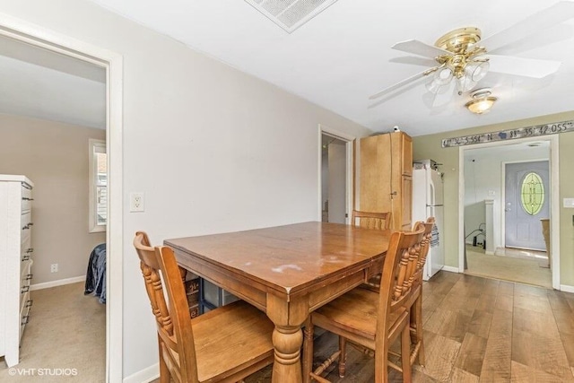 2605 Cameron St, Delavan, WI 53115 - dining room featuring ceiling fan, baseboards, and wood finished floors