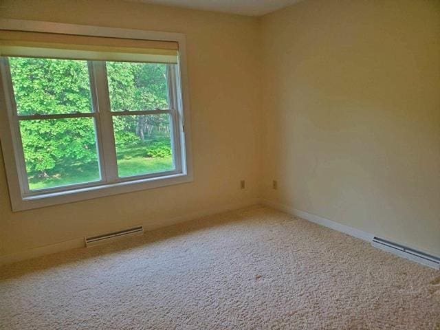 9350 County Road F, Milladore, WI 54454 - carpeted spare room featuring a baseboard radiator and baseboards