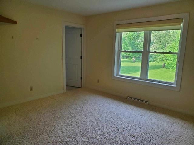 9350 County Road F, Milladore, WI 54454 - spare room featuring carpet flooring and baseboards