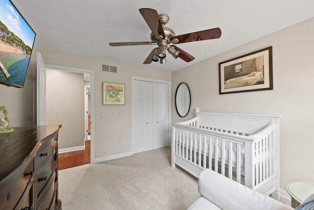 102 Abbey Ridge Ct Unit 102, Fontana, WI 53125 - bedroom featuring a closet, baseboards, a ceiling fan, and carpet flooring
